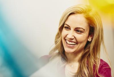 Smiling woman in an office Smiling woman in an office